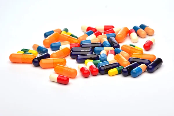 Colourful pills on white background — Stock Photo, Image