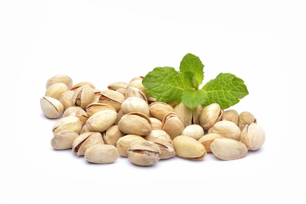 Heap of pistachios on the white background — Stock Photo, Image