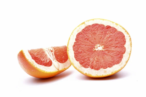 Grapefruit slices on white background — Stock Photo, Image