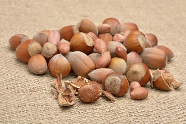 Nuts on old canvas — Stock Photo, Image