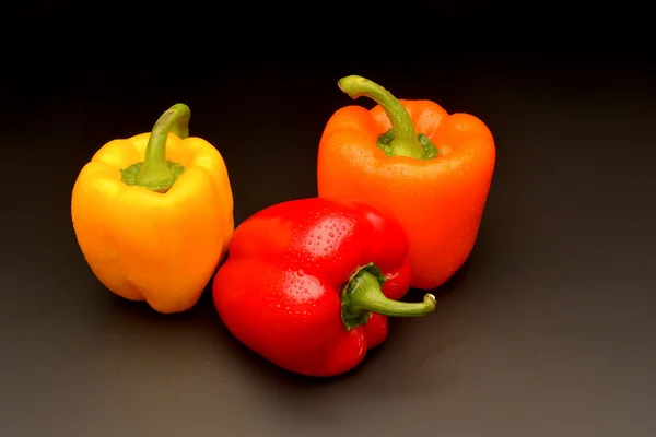 Sweet pepper on black background — Stock Photo, Image