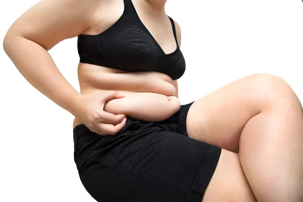 Fat woman squeeze belly obese wearing black underwear bra overweight concept — Stock Photo, Image