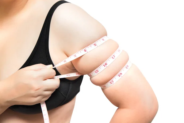 Fat woman show and  squeeze tighten, arm body fat by measure tap — Stock Photo, Image