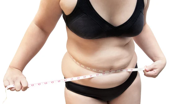 Woman show body fat wearing black underwear bra on white isolated — Stock Photo, Image