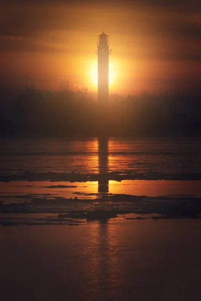 Lonely Lighthouse Frozen Seashore Sunset Atmospheric Winter Landscape Warm Golden — Stock Photo, Image