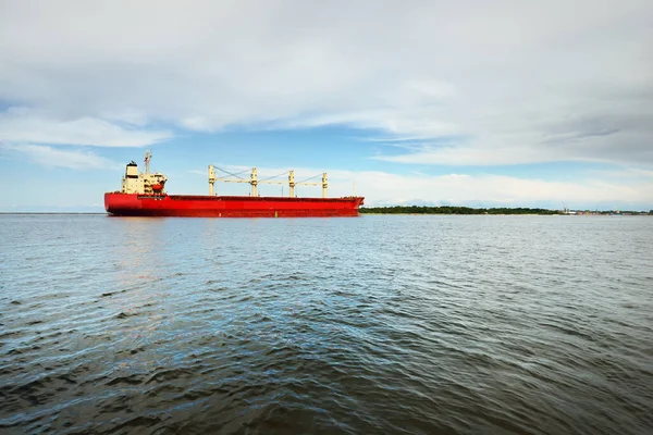 Large Red Bulk Carrier Cargo Ship Cranes Sailing Open Sea Stock Picture