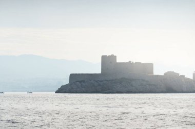 A fortress tower of the Chteau d'If, close-up view from the sailing boat. Frioul archipelago, Mediterranean sea, bay of Marseille, France. Travel destinations, national landmark, sightseeing.