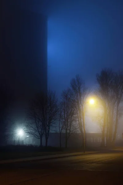 Empty Illuminated Motorway Closed Shops Fog Night Road Sign Close — Stock Photo, Image