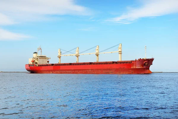 Large Red Bulk Carrier Cargo Ship Cranes Sailing Open Sea — Stock Photo, Image