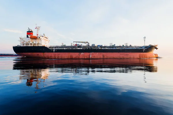 Large Cargo Ship Sunset Reflection Water Colorful Evening Clouds Bright — Stock Photo, Image