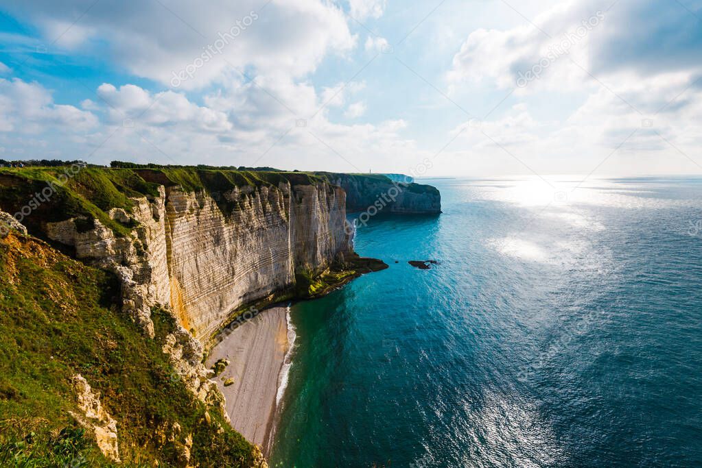 Aerial view of the Etretat white cliffs. Clear blue sky. Normandy, France