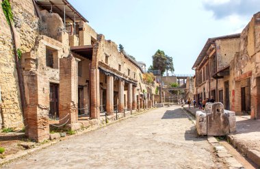 ERCOLANO, ITALY - SEPTEMBER 9, 2017: Photo of The street of the ancient city of Herculaneum. clipart