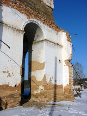Bell tower of the Trinity Church. The village of Antonovo. Sverdlovsk region. Russia.Date of shooting Feb. 17, 2012