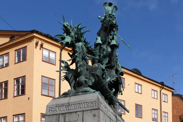 Sweden. Stockholm. Sculpture of St. George the Victorious striking sword dragon. — Stock Photo, Image