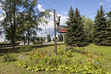 VELIKY NOVGOROD, RUSSIA -  AUGUST 02, 2015: Photo of Monument electrician, rescues cat.