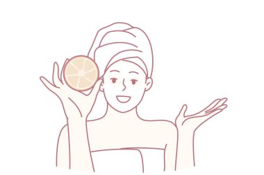 Doğal malzemelerle yapılan nazik yüz rutini, doğal olarak cilt geliştirmeye odaklanan spa deneyimi, turunçgil ve havluları içeren kişisel bakım seansı doğal olarak cildin canlandırılması için.