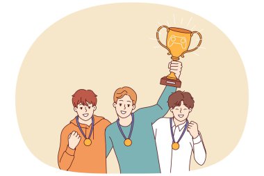 Esport turnuvasını kazandıkları için kupa kazanan oyuncular zaferi kutluyor ve altın madalya alıyorlar. Sanal yarışmalarda birinci olan gençlerin ellerinde ihracat başarısı ödülü
