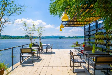 Outdoor restaurant with beautiful view on Lake. clipart