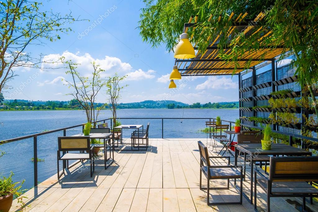 Outdoor restaurant with beautiful view on Lake. — Stock Photo © seksan44 #66246069