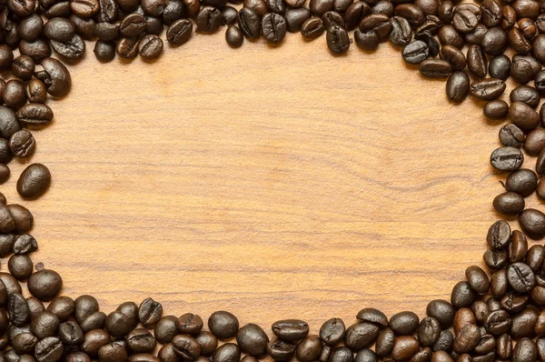 Kaffe bean på trä — Stockfoto