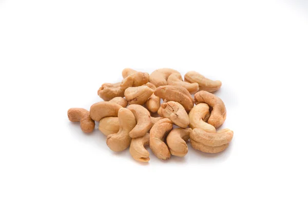 Pile of roasted cashew nuts in white background — Stock Photo, Image