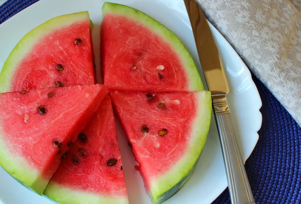 Melon d'eau, coupé en morceaux, vue de dessus — Photo