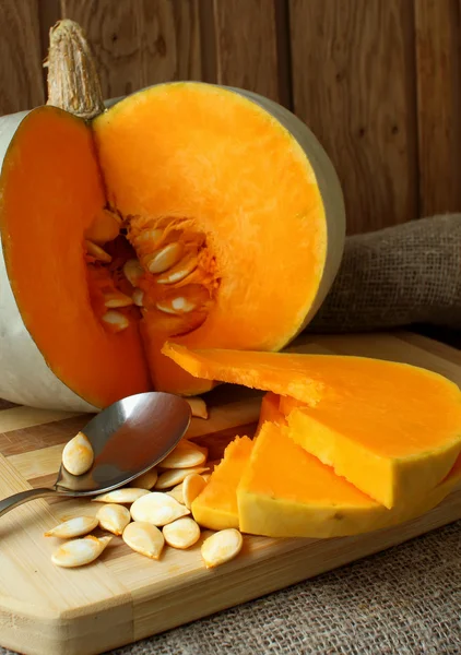 Pumpkin, cut with seeds inside — Stock Photo, Image