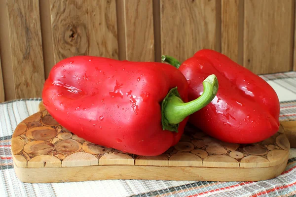 Red pepper on a blackboard — Stock Photo, Image