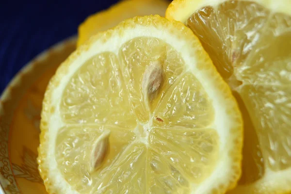 Lemon and lemon slice close-up Stock Photo