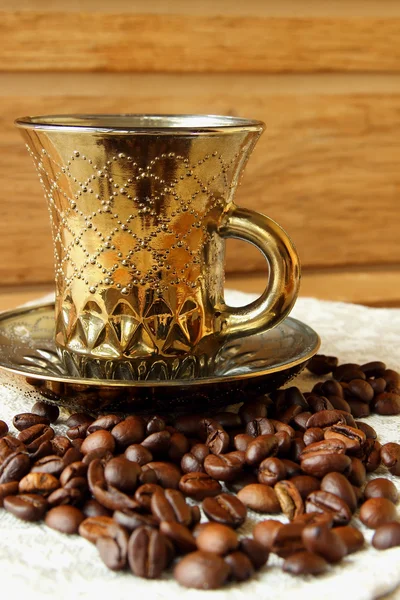 Taza de café y granos de café —  Fotos de Stock