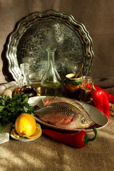 Still life with carp and vegetables — Stock Photo, Image