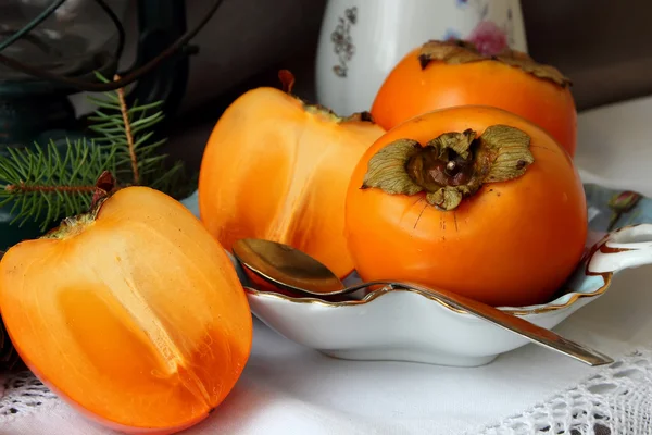 Still life with persimmons — Stock Photo, Image