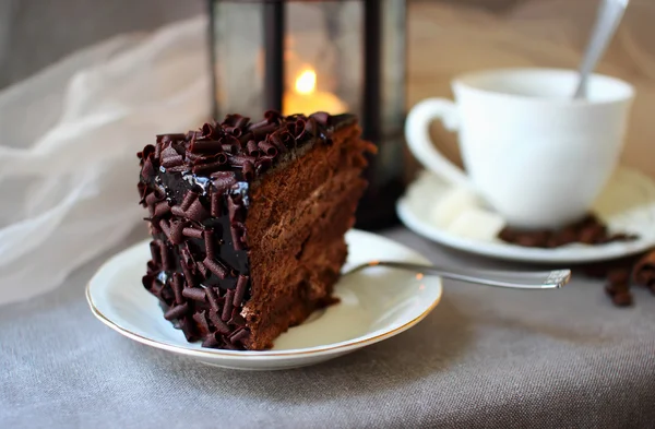 A piece of chocolate cake and coffee — Stock Photo, Image