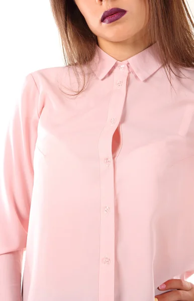 Młody model w ścisłym bluzka blady różowy. — Zdjęcie stockowe