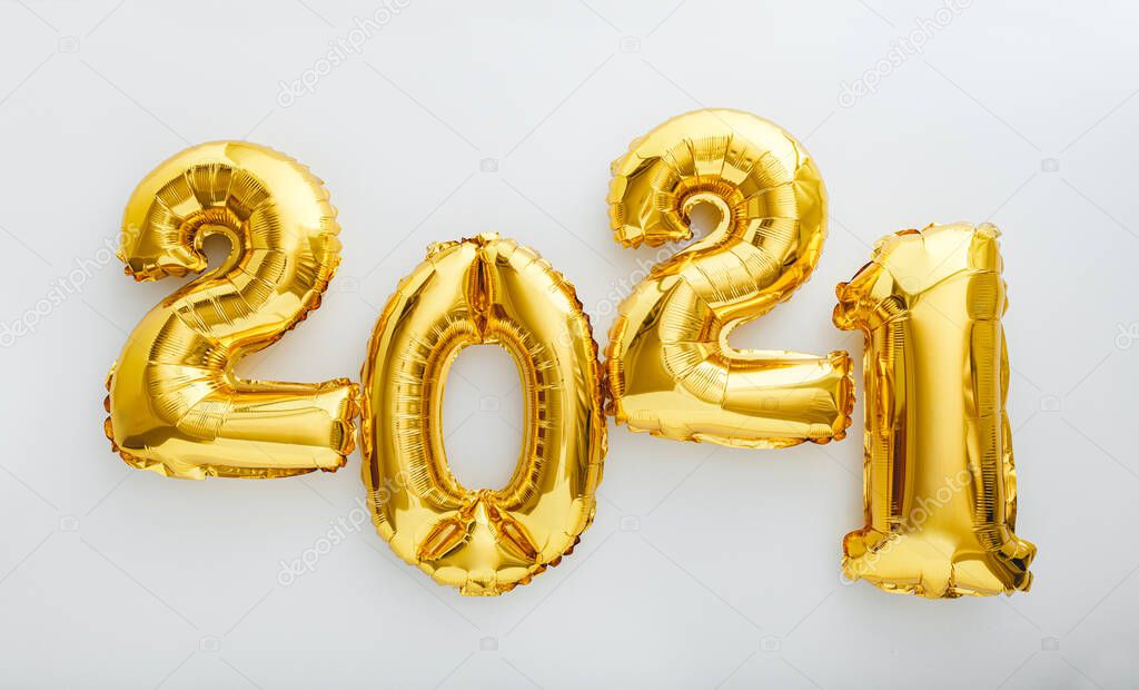 2021 balloon text on white background. Happy New year eve invitation with Christmas gold foil balloons 2021. Flat lay long web banner.