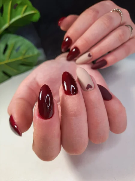 Beautiful Burgundy Manicure Heart Design Beige Background Women Fingers Beautiful — 스톡 사진