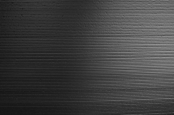 Płyta z tworzywa sztucznego z teksturą czarna fala — Zdjęcie stockowe