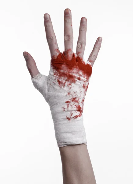 Shook his bloody hand in a bandage, bloody bandage, fight club, street fight, violence, bloody theme, black background, isolated, bloody fists, boxer, tied his hands with a bandage, white background — Stock Photo, Image