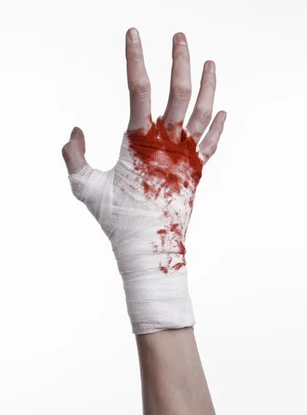 Shook his bloody hand in a bandage, bloody bandage, fight club, street fight, violence, bloody theme, black background, isolated, bloody fists, boxer, tied his hands with a bandage, white background — Stock Photo, Image