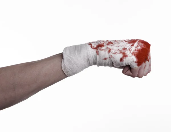 Shook his bloody hand in a bandage, bloody bandage, fight club, street fight, violence, bloody theme, black background, isolated, bloody fists, boxer, tied his hands with a bandage, white background — Stock Photo, Image