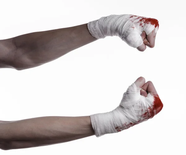 Shook his bloody hand in a bandage, bloody bandage, fight club, street fight, violence, bloody theme, black background, isolated, bloody fists, boxer, tied his hands with a bandage, white background — Stock Photo, Image