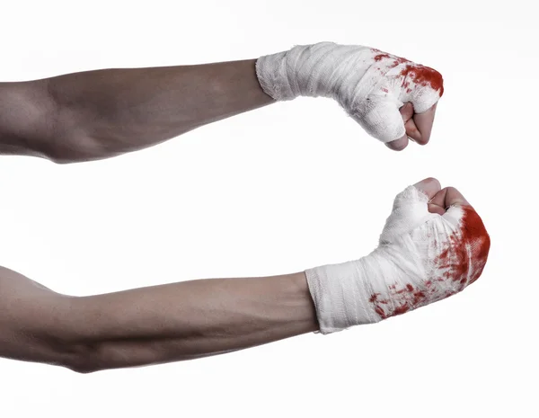 Shook his bloody hand in a bandage, bloody bandage, fight club, street fight, violence, bloody theme, black background, isolated, bloody fists, boxer, tied his hands with a bandage, white background — Stock Photo, Image