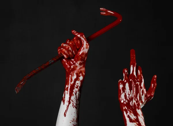 Bloody hands with a crowbar, hand hook, halloween theme, killer zombies, black background, isolated, bloody crowbar — Stock Photo, Image