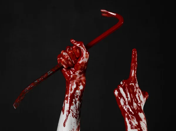 Bloody hands with a crowbar, hand hook, halloween theme, killer zombies, black background, isolated, bloody crowbar — Stock Photo, Image