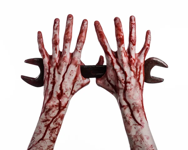 Sangrienta mano sosteniendo una gran llave, llave sangrienta, gran llave, tema sangriento, tema de Halloween, mecánico loco, asesino, psicópata, violencia, zombis, fondo blanco, aislado, revolución — Foto de Stock