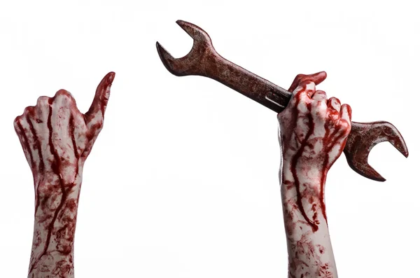 Bloody hand holding a big wrench, bloody wrench, big key, bloody theme, halloween theme, crazy mechanic, murderer, psycho, violence, zombies, white background, isolated, revolution — Stock Photo, Image