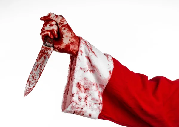 Tema de Navidad y Halloween: Las sangrientas manos de un loco sosteniendo un cuchillo ensangrentado sobre un fondo blanco aislado —  Fotos de Stock