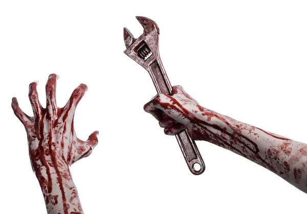 Halloween theme: bloody hand holding a big wrench on a white background — Stock Photo, Image
