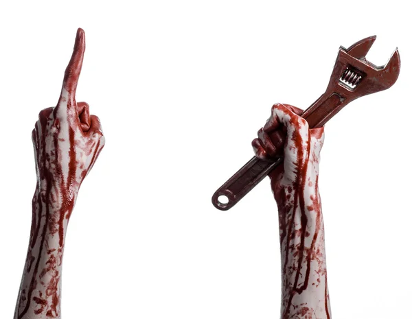 Halloween theme: bloody hand holding a big wrench on a white background — Stock Photo, Image