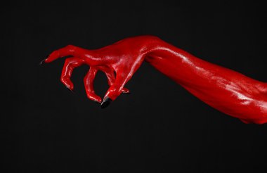 Halloween Tema, siyah arka plan, izole kırmızı şeytan'ın eller, kırmızı eller şeytanın